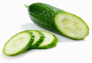A piece of cucumber and cucumber slices